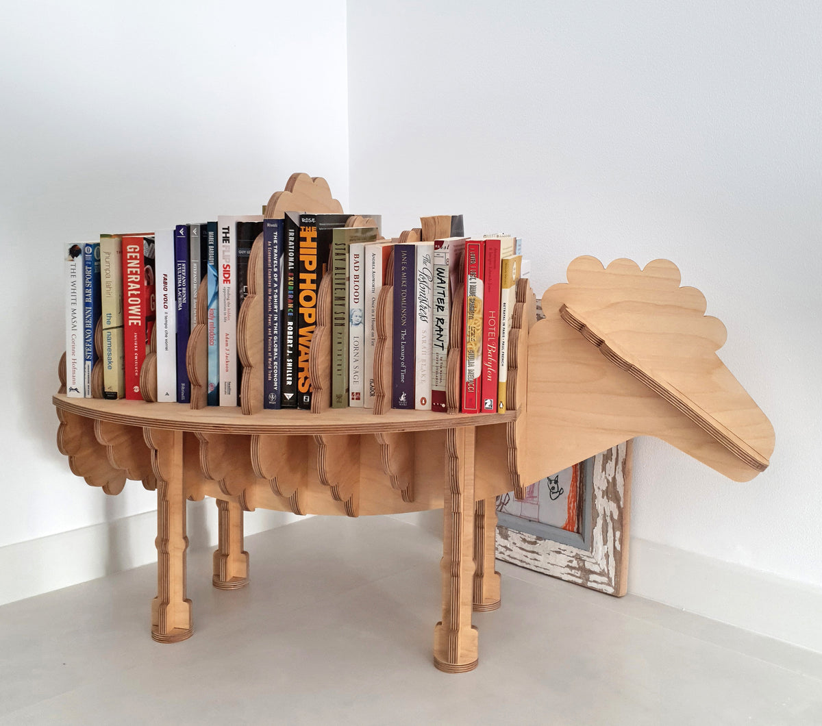 Sheep Bookcase, a sheep-shaped birch plywood children's bookcase, handmade in Dubai by Plyconcept
