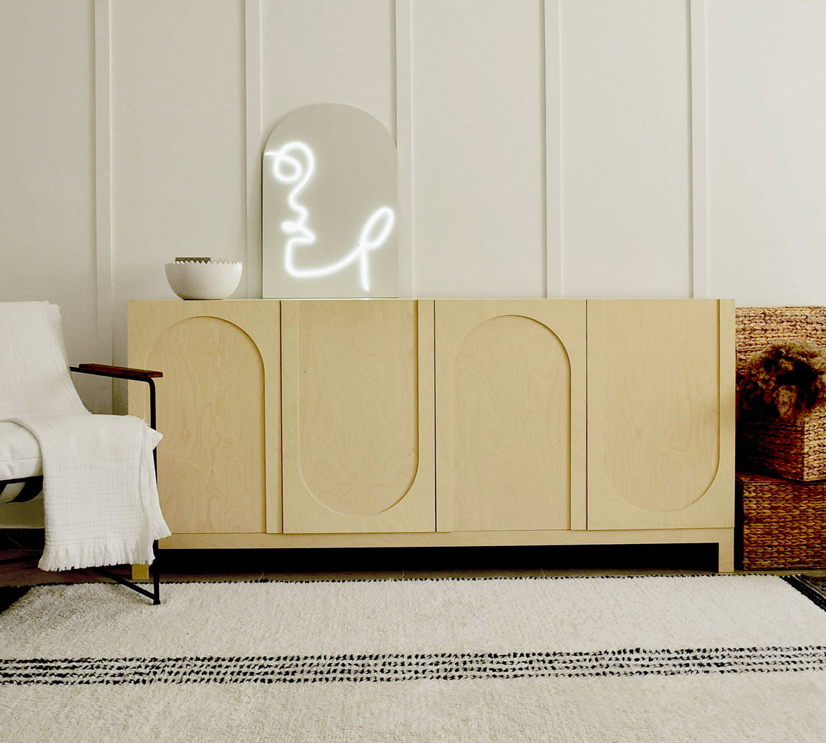 Boho Soul sideboard in sealed birch plywood in a bright Dubai living room, showing the surface and exposed plywood edge that a damp cloth keeps clean