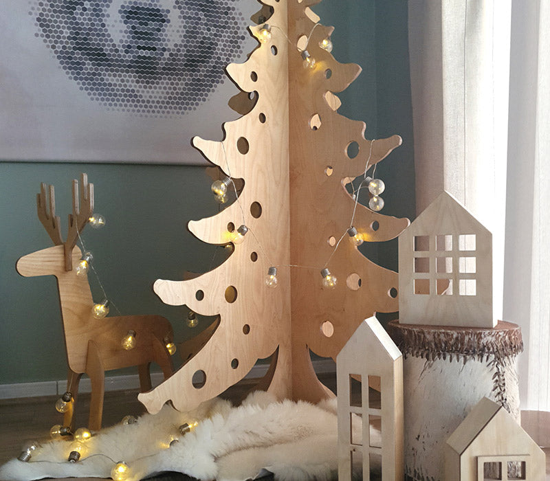 Douglas wooden Christmas tree in sealed birch plywood, a flat-pack tree that slots together without tools, handmade in Dubai by Plyconcept