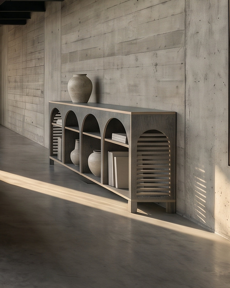 Render: the Jeffrey Lungo sideboard in Smoke birch plywood, four open arches, in a shaft of sun