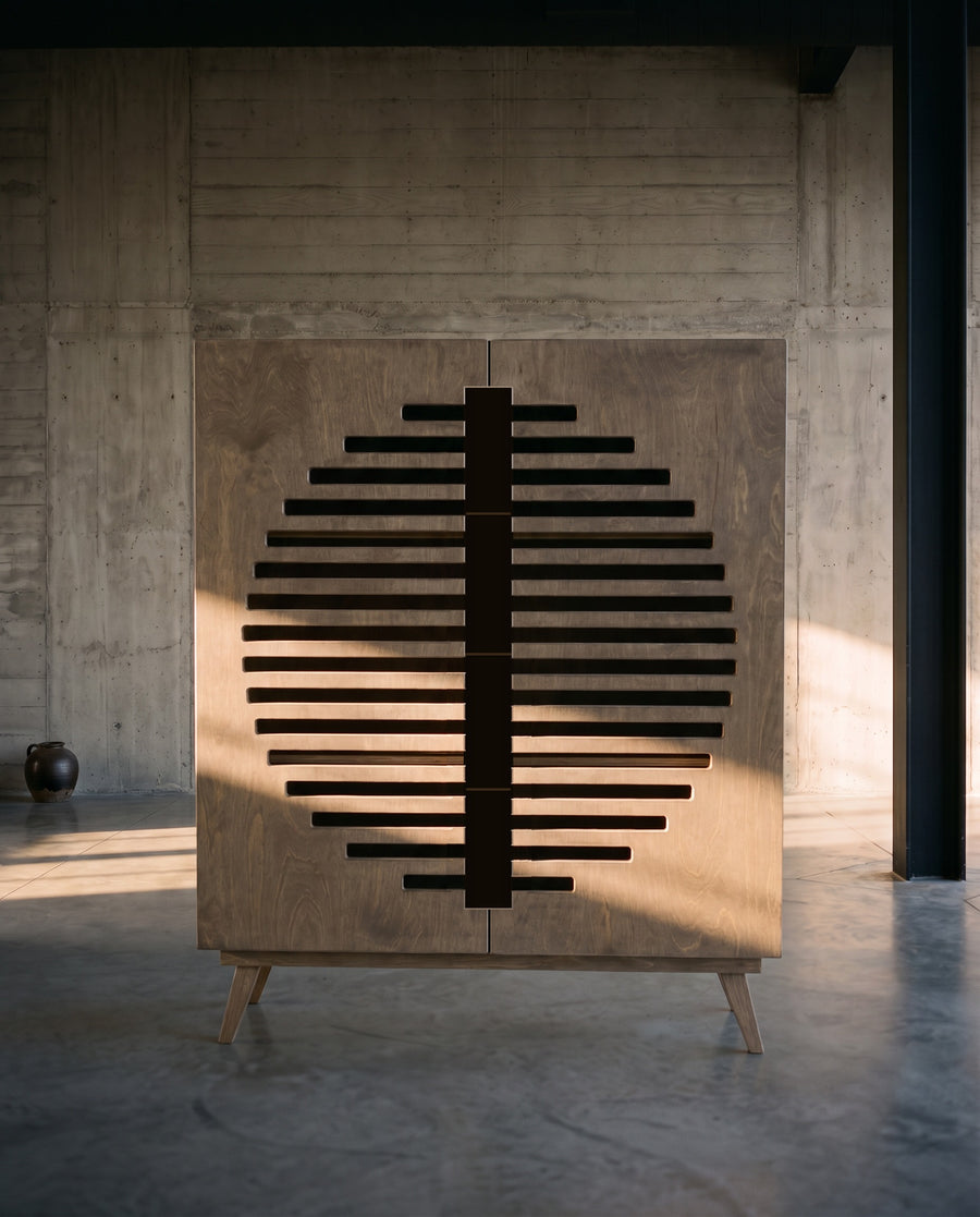 Render: the Zoe side cabinet in Sand birch plywood against a board-formed concrete wall